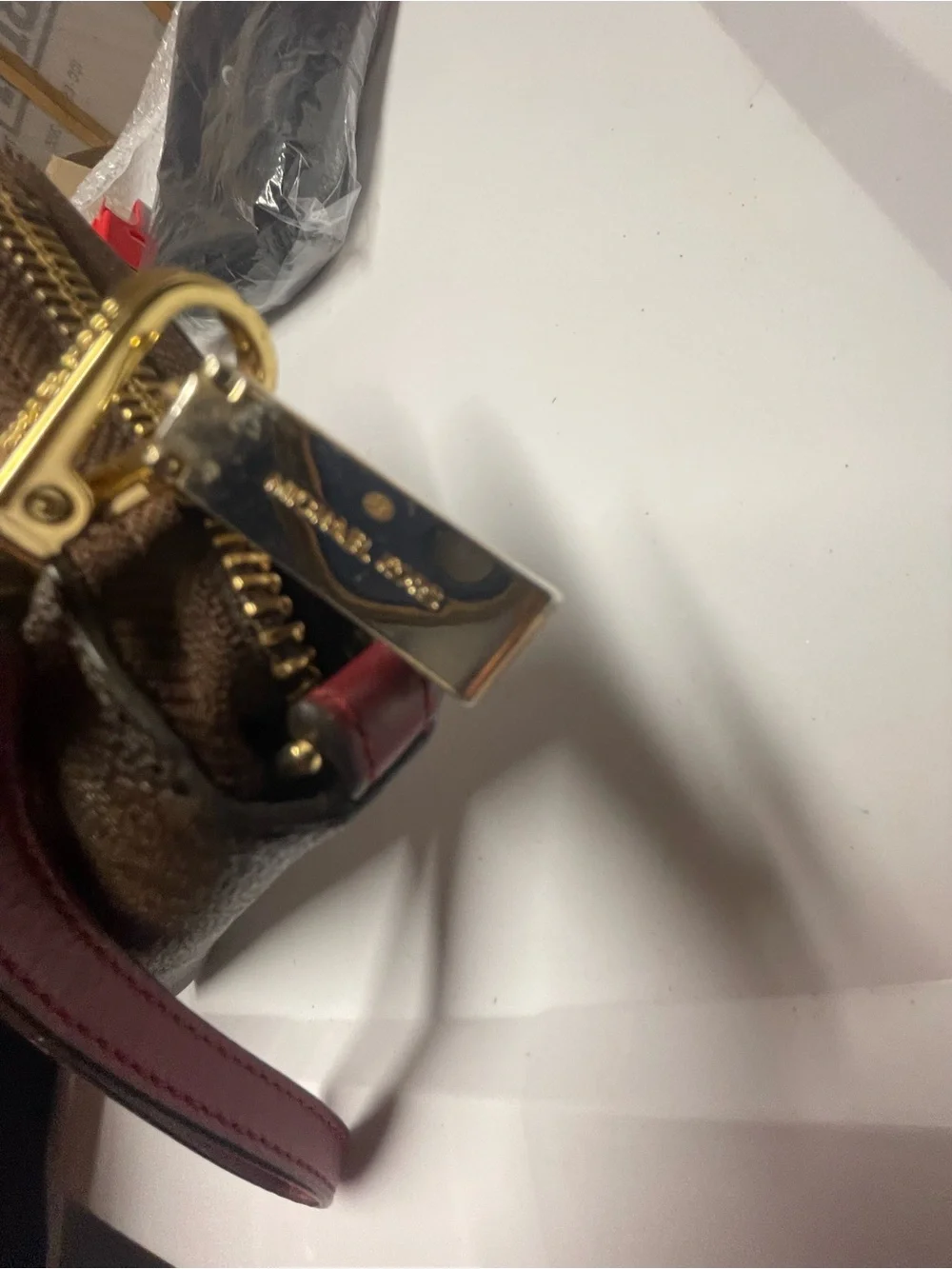 Michael Kors Brown Logo Zip Wallet with Gold Plate